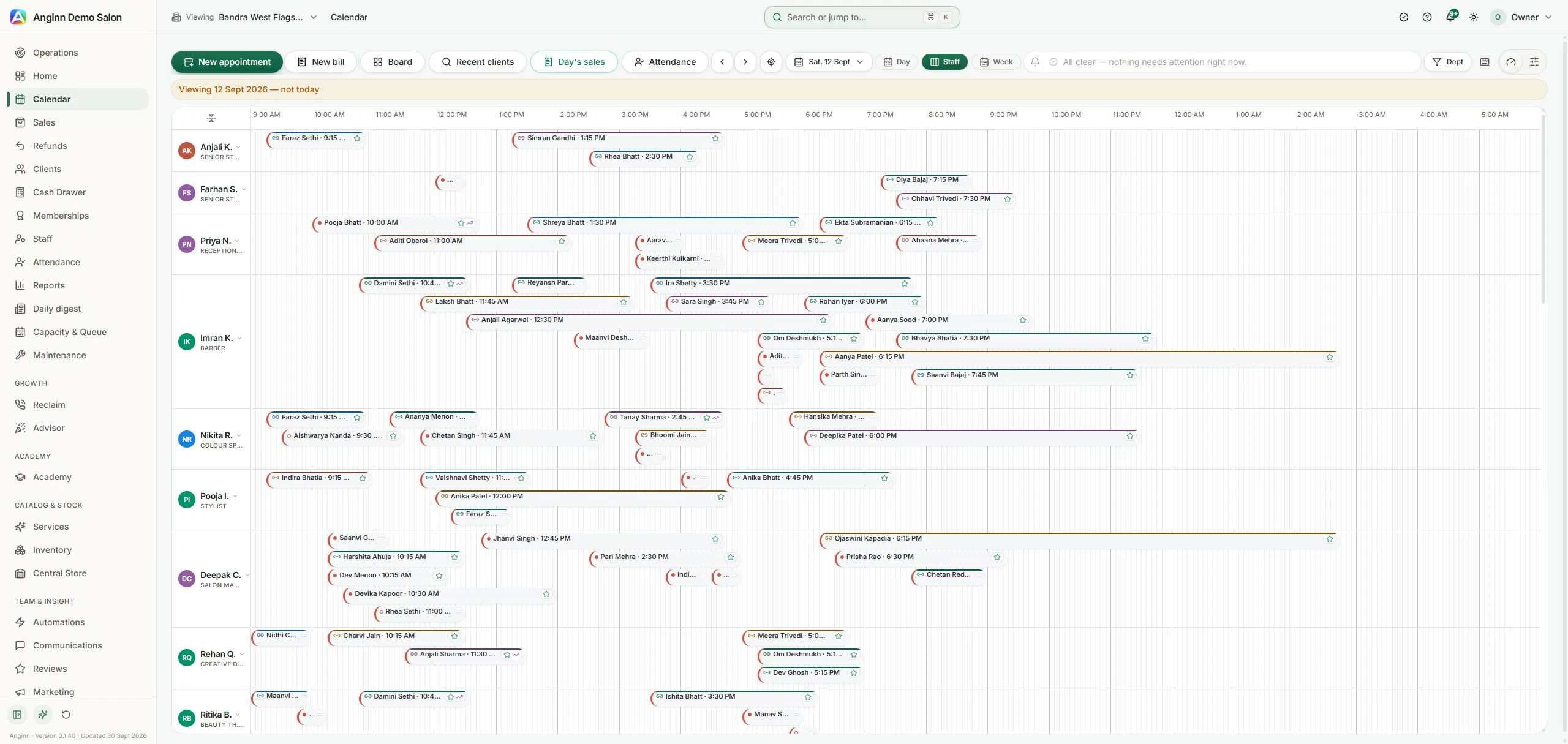 Actual Anginn OS staff calendar with time across the top, team members down the side and many coloured appointment bars. Fictional demo data, captured 30 September 2026.